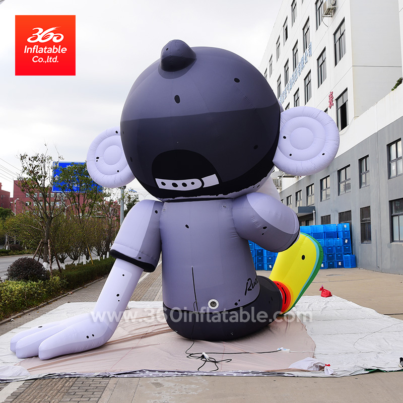 Custom products outdoor huge inflatable cartoon colorful pianting Graffiti boy sitting ontheground for advertising